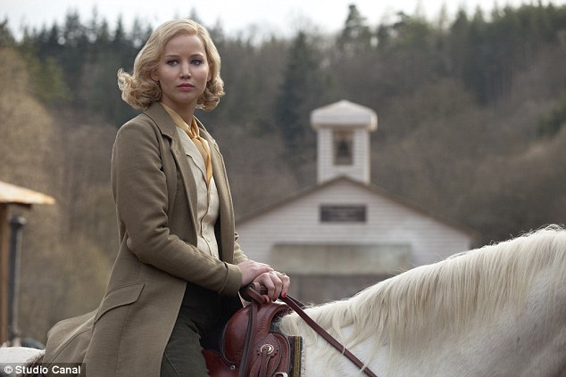 On horseback: Jennifer Lawrence has a regal air in a still from the upcoming drama Serena